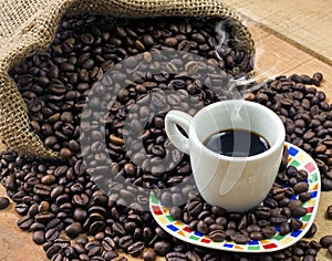 Coffee cup and coffee beans