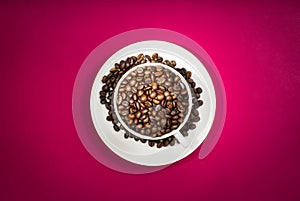 Coffee cup with coffee beans.