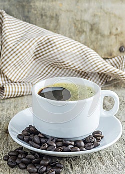 Coffee cup and coffee beans