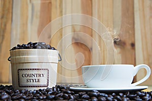 Coffee cup and Coffee beans with casks