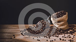 Coffee cup and Coffee beans spread on the table wooden old with copys for your text