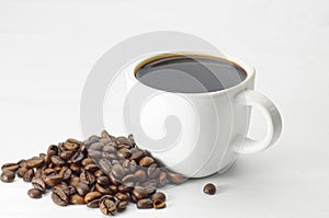 Coffee Cup and coffee beans on white background