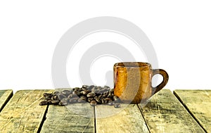 Coffee cup and coffee beans on wooden on white background
