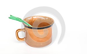 Coffee cup and coffee sachets on white background.