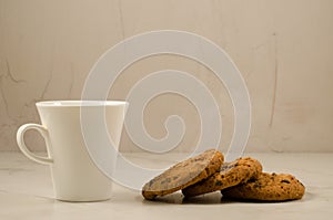 coffee cup and cookies/ Breakfast whith coffee cup and cookies on a marble background, selective focus