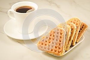 coffee cup and cookies heart/ coffee cup and cookies heart on a marble background, selective focus