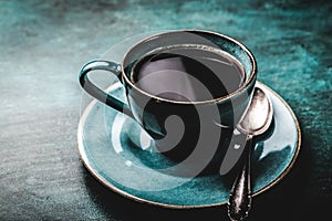 Coffee cup on a dark background