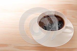 Coffee Cup on the Desk, Above view. Cup of tea. wooden background. Cup of Coffee on Wooden Tabletop. Copy space. Top view