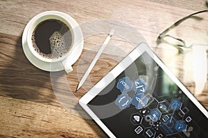 Coffee cup and Digital table dock smart keyboard,eyeglasses,stylus pen on wooden table,filter effect photo