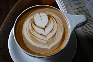 Coffee cup with heart in foam