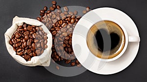 Coffee cup with a heart sign and coffee beans in a sack on a dark background, top view