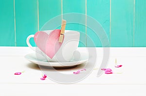 Coffee cup with heart tag