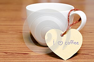 Coffee cup with heart tag write I love coffee word