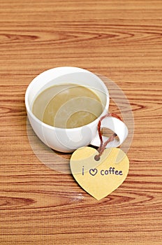 Coffee cup with heart tag write I love coffee word