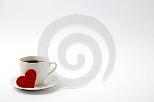 Coffee cup with heart on white texture. love. valentines day