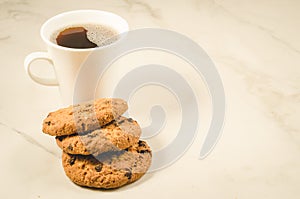 coffee cup and homemade cookies with chocolate/ Breakfast whith coffee cup and homemade cookies with chocolate, copyspace