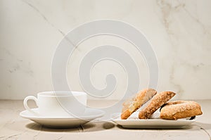 coffee cup and homemade cookies/ coffee cup and homemade cookies on a white table, selective focus