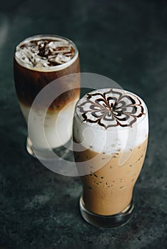 Coffee cup and iced capuchino