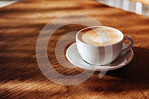 Coffee cup latte art in cafe