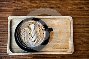 Coffee cup with latte art foam