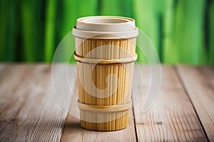 a coffee cup made from bamboo on a wooden table