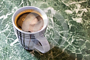 Coffee cup on marble table background in Brest Belarus