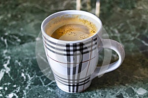 Coffee cup on marble table background in Brest Belarus