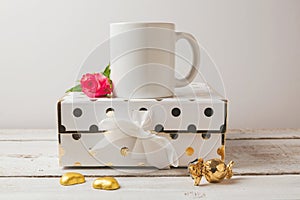 Coffee cup mock up with golden feminine objects