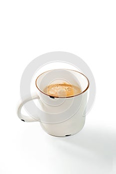 Coffee cup in the morning light on white background