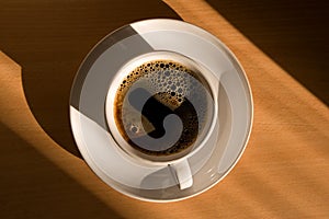 Coffee cup in the morning sun