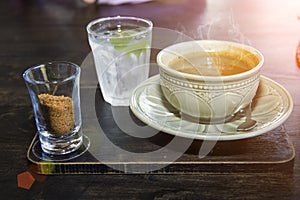 Coffee cup nearside sugar and drink water