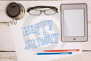 Coffee cup, notebook and ebook