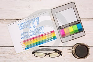 Coffee cup, notebook and ebook