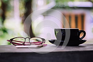 Coffee cup on old wooden table