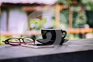 Coffee cup on old wooden table