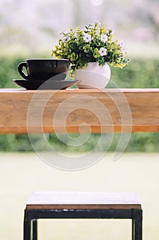 Coffee cup on old wooden table