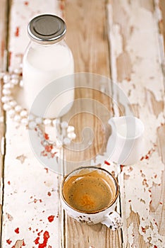 Coffee cup on old wooden table