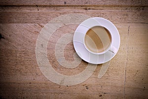 coffee cup on old wooden table