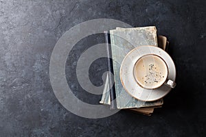 Coffee cup over books