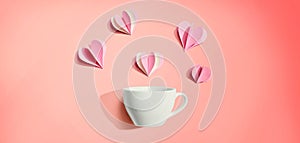 Coffee cup with paper craft hearts