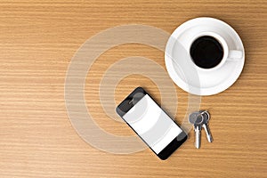 Coffee cup and phone and key