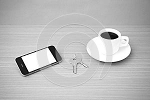 Coffee cup and phone and key