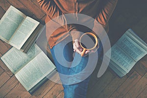 Coffee cup after reading books