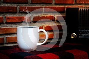 Coffee cup and Retro radio on table