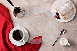 Coffee cup rolls with cream cezve milk spoon red napkin