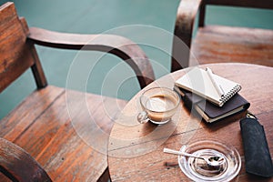 Coffee cup on rustic wood table