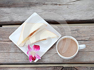 Coffee cup with sanwich