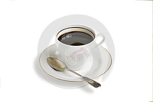 A coffee cup on a saucer.