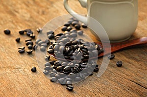 Coffee cup and saucer on a wooden table