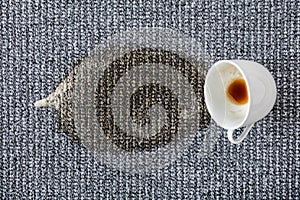Coffee cup spilled on the carpet